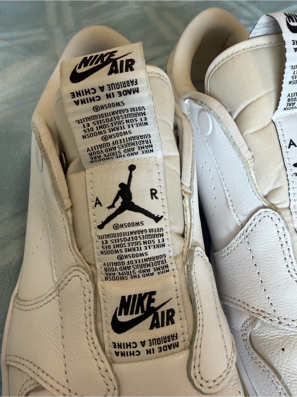 WOMANS Nike Air Jordan White Leather Sneakers with Black Logos slips